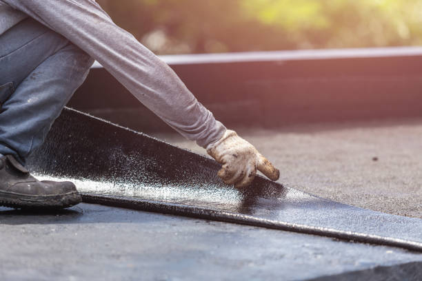 Professional Waterproofing technician working in Krakow, WI